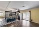Open concept space with a view into the kitchen and access to the backyard at 3307 E Kings Ave, Phoenix, AZ 85032