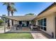 Inviting outdoor patio with tables, chairs, and a covered awning, perfect for relaxing or entertaining at 3307 E Kings Ave, Phoenix, AZ 85032