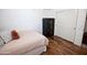 Comfortable bedroom with a bed and a safe for added security at 3314 E Page Ave, Gilbert, AZ 85234