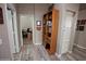 Hallway view shows bedroom and bookcase at 3314 E Page Ave, Gilbert, AZ 85234