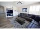 Comfortable living room with a large sectional sofa and stylish decor at 3314 E Page Ave, Gilbert, AZ 85234