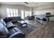 Open-concept living area features a dining area, kitchen, and spacious seating at 3314 E Page Ave, Gilbert, AZ 85234