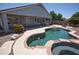 Backyard with pool, spa and covered patio with grill at 3314 E Page Ave, Gilbert, AZ 85234