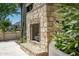 Outdoor stone fireplace with seating area, perfect for cozy evenings at 3506 N Crystal Peak Cir, Mesa, AZ 85207