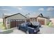 Spacious three-car garage with stylish doors and ample parking space in front at 3506 N Crystal Peak Cir, Mesa, AZ 85207