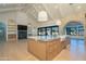 Open-concept kitchen with a large island, modern appliances, and seamless access to living areas at 3506 N Crystal Peak Cir, Mesa, AZ 85207
