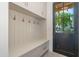 Well-organized mudroom with built-in bench and storage, providing a convenient entry point at 3506 N Crystal Peak Cir, Mesa, AZ 85207
