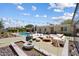 Inviting backyard with string lights, lounge seating and a refreshing pool at 3814 E Poinsettia Dr, Phoenix, AZ 85028