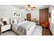 Stylish bedroom with a comfortable bed and modern decor at 3814 E Poinsettia Dr, Phoenix, AZ 85028
