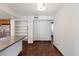 Open kitchen area featuring built-in shelving and ample counter space at 3814 E Poinsettia Dr, Phoenix, AZ 85028