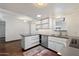Spacious kitchen with stainless steel appliances and updated countertops at 3814 E Poinsettia Dr, Phoenix, AZ 85028