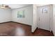 Bright room with natural light from window; includes tile floor and white door at 3814 E Poinsettia Dr, Phoenix, AZ 85028