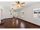 Spacious room with tile floor that extends to an outdoor patio through french doors at 3814 E Poinsettia Dr, Phoenix, AZ 85028