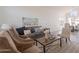 Comfortable living room showcasing stylish decor, a patterned rug, and a serene ambiance at 3837 E Windsong Dr, Phoenix, AZ 85048