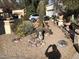 Front yard features desert landscaping, gravel, cacti, rock details, and a concrete sitting bench at 401 W Cape Royal Ln, Phoenix, AZ 85023