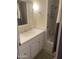 Bright bathroom featuring a vanity and a shower/tub combination at 4065 E University Dr # 155, Mesa, AZ 85205