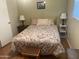 Comfortable bedroom offering peaceful ambiance with natural light and furnishings at 4065 E University Dr # 155, Mesa, AZ 85205