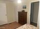 Serene bedroom setting with wooden dresser and a relaxing ambiance at 4065 E University Dr # 155, Mesa, AZ 85205