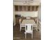 Dining room featuring hardwood floors, table with chairs and natural light at 4065 E University Dr # 155, Mesa, AZ 85205