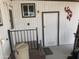 Shows the exterior door and window with unique decorations enhancing its curb appeal at 4065 E University Dr # 155, Mesa, AZ 85205