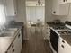 Efficient kitchen featuring light countertops, and direct sight lines to the dining area at 4065 E University Dr # 155, Mesa, AZ 85205