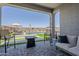 Inviting covered patio overlooking a refreshing pool and relaxing outdoor area at 40848 W Hillman Dr, Maricopa, AZ 85138