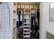 Organized closet with shelving, hanging racks, and storage bins for optimal storage at 4313 E Briarwood Ter, Phoenix, AZ 85048