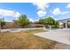 Secluded backyard featuring mature trees, lush shrubs, and a sparkling pool at 4340 E Nisbet Rd, Phoenix, AZ 85032