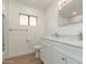 Bright bathroom featuring double sinks with stone countertops and framed mirrors at 4340 E Nisbet Rd, Phoenix, AZ 85032
