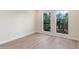 Bedroom with wood-look flooring, recessed lighting and two windows providing natural light at 4340 E Nisbet Rd, Phoenix, AZ 85032