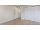This bedroom has a closet with light wood laminate flooring at 4340 E Nisbet Rd, Phoenix, AZ 85032
