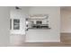 Modern kitchen featuring stainless steel appliances, granite countertops, and white cabinets at 4340 E Nisbet Rd, Phoenix, AZ 85032