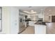 Well-equipped kitchen with stainless steel appliances, white cabinets, and granite countertops, ideal for cooking at 4340 E Nisbet Rd, Phoenix, AZ 85032