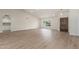 Inviting living area with wood-style floors and large windows, perfect for relaxing or entertaining guests at 4340 E Nisbet Rd, Phoenix, AZ 85032