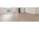 Bright and airy living room featuring updated flooring and neutral wall colors that create a welcoming atmosphere at 4340 E Nisbet Rd, Phoenix, AZ 85032