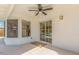 Covered patio featuring a ceiling fan, exterior lighting and access to the pool area at 4340 E Nisbet Rd, Phoenix, AZ 85032