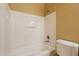 A bathroom featuring a standard bathtub and toilet setup at 4432 W Pleasant Ln, Laveen, AZ 85339