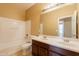 Bathroom with double sink vanity and bathtub at 4432 W Pleasant Ln, Laveen, AZ 85339