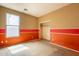 Empty bedroom with a window and closet space, ready for personalization at 4432 W Pleasant Ln, Laveen, AZ 85339