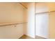 A bare walk-in closet with shelving at 4432 W Pleasant Ln, Laveen, AZ 85339
