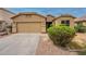 Exterior image showcasing the driveway and front of the home at 4432 W Pleasant Ln, Laveen, AZ 85339