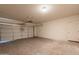 Spacious two-car garage with automatic door opener and access door to the house at 4432 W Pleasant Ln, Laveen, AZ 85339
