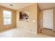 Living room features tile flooring, natural light, and a view of the kitchen at 4432 W Pleasant Ln, Laveen, AZ 85339