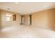 Open living area with tile flooring and recessed lighting at 4432 W Pleasant Ln, Laveen, AZ 85339