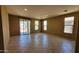 Bright living room with lots of natural light and access to the backyard at 4432 W Pleasant Ln, Laveen, AZ 85339