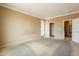A spacious main bedroom boasts neutral walls, a glass door to the yard, and multiple entryways at 4432 W Pleasant Ln, Laveen, AZ 85339