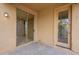 Covered patio with a sliding glass door and an adjacent door offering outdoor access at 4432 W Pleasant Ln, Laveen, AZ 85339