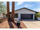 Charming single-story home with a well-maintained front yard and a two-car garage at 4510 N 105Th Ave, Phoenix, AZ 85037
