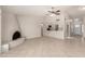 Spacious living room with a ceiling fan, and an open view to the kitchen at 4510 N 105Th Ave, Phoenix, AZ 85037