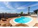 View of a refreshing kidney shaped pool in a well maintained backyard at 4510 N 105Th Ave, Phoenix, AZ 85037